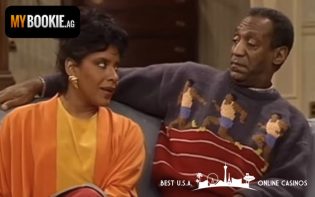Claire and Heathcliff Huxtable on Couch
